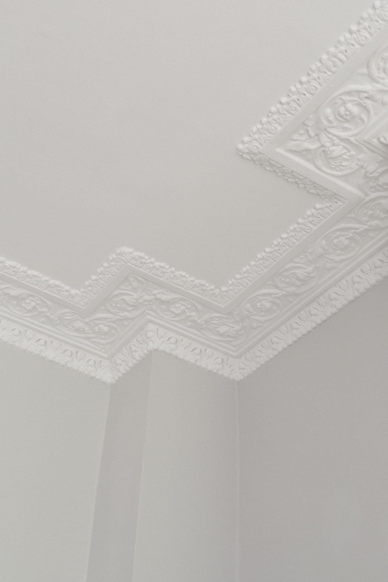Ornate plaster cornice and ceiling detail in a London townhouse